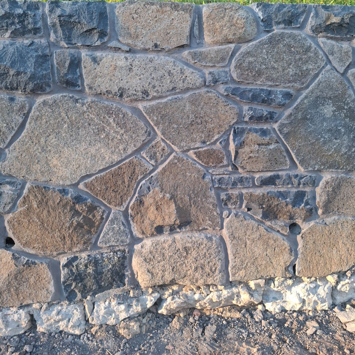 Nimmitabel basalt, raked mortar joint wall, natural stone masonry by Homestead Stonework, Canberra region
